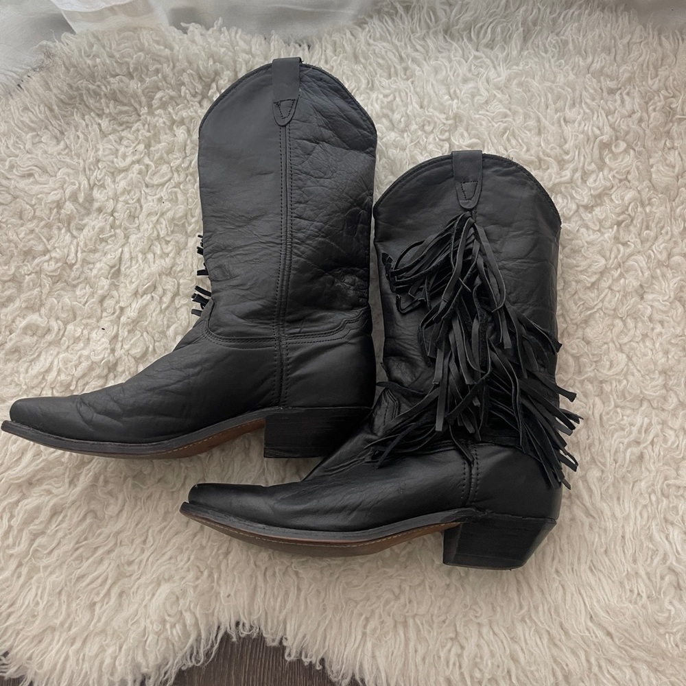 Vintage black genuine leather western boots with side fringe detail.